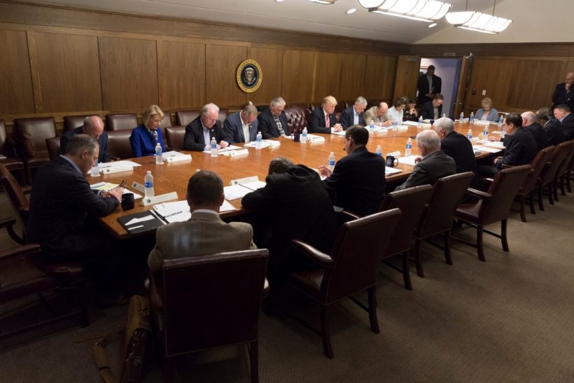 President Donald J. Trump, joined by Vice President Mike Pence and members of the Cabinet, are seen in prayer prior to the start of their Cabinet meeting, Saturday, September 9, 2017 in Laurel Lodge at Camp David near Thurmont, MD, discussing the projected track and potential impact of Hurricane Irma as it approaches the coast of Florida.