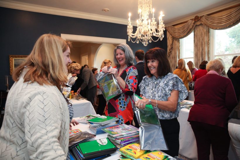 Second Lady Karen Pence and guests assemble art supply kits.