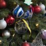 Ornaments created by military families hang on the Christmas tree in the sunroom.