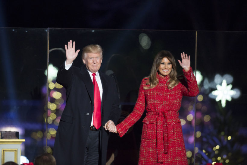 President Donald J. Trump and First Lady Melania Trump wave to the crowd as they arrive to the 2017 National Christmas Tree Lighting ceremony on the Ellipse, Thursday, November 30, 2017, in Washington, D.C. This year the National Christmas Tree Lighting ceremony celebrates its 95th year.