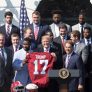 President Donald J. Trump receives an Alabama team jersey during ceremonies celebrating the 2017 College Football National Champions the Alabama Crimson Tide, on the South Lawn at the White House, Tuesday, April 10, 2018, in Washington, D.C.