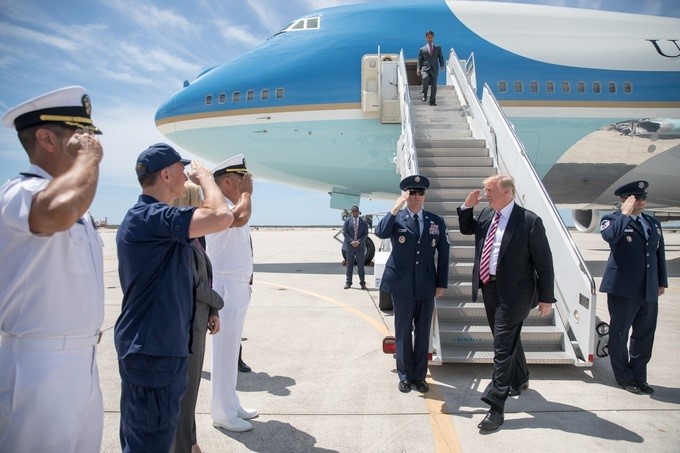 President Donald J. Trump disembarks Air Force One at Naval Air Station Key West, Thursday, April 19, 2018, and is greeted by Secretary of Homeland Security, Kirstjen Nielsen, ADM Paul Zukunft, Commandant of the United States Coast Guard, Cpt. Bobby Baker, Commanding Office of Naval Air Station Key West, Com Greg Brotherton, Executive Officer of Naval Air Station Key West, Rear ADM Stephanie Keek, Deputy Director of Joint Interagency Task Force-South and supporters, in Key West, Florida.