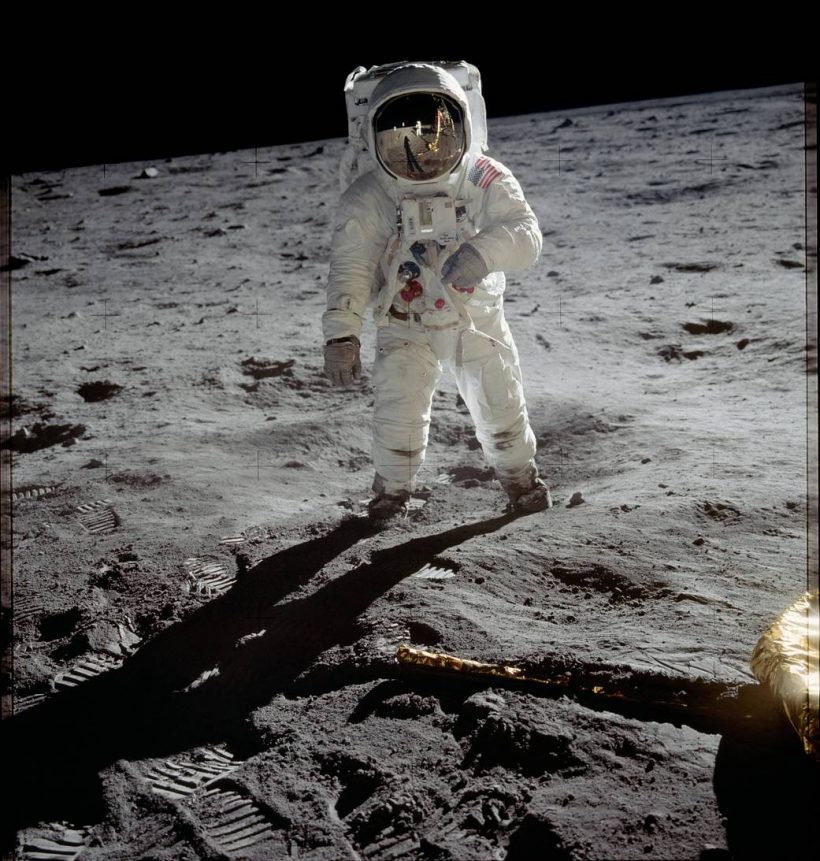 Astronaut Buzz Aldrin walks on the surface of the moon